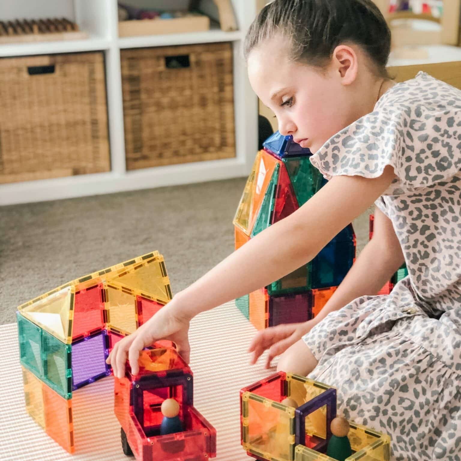 Girl playing with the 24 piece motion pack rainbow