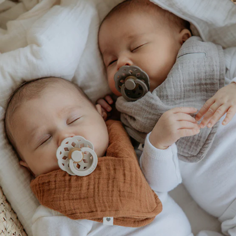 Babies using the Boheme bibs dummies