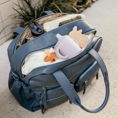 Carry all nappy bag in stone blue open and packed