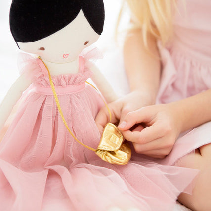 charlotte doll blush pink dress gold bag alimrose
