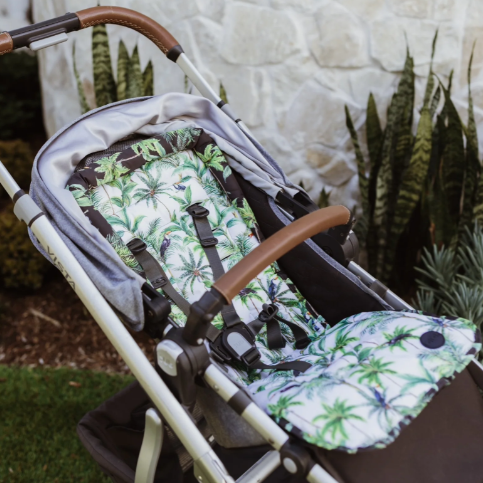Pram seat liner on a pram in tropical print