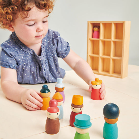 Child playing with the happy folk hotel
