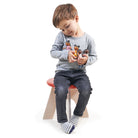 Boy playing with the humming bird family