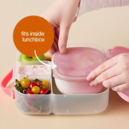 person using b.box lunch tub color berry