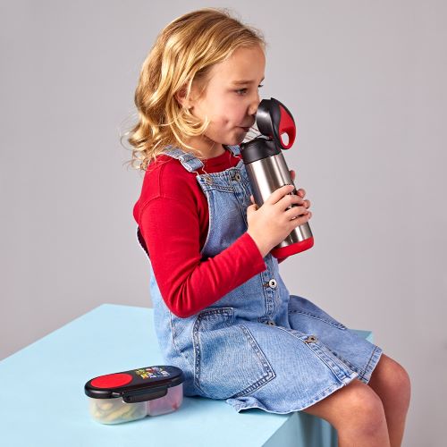 Girl drinking from a avengers insulated drink bottle