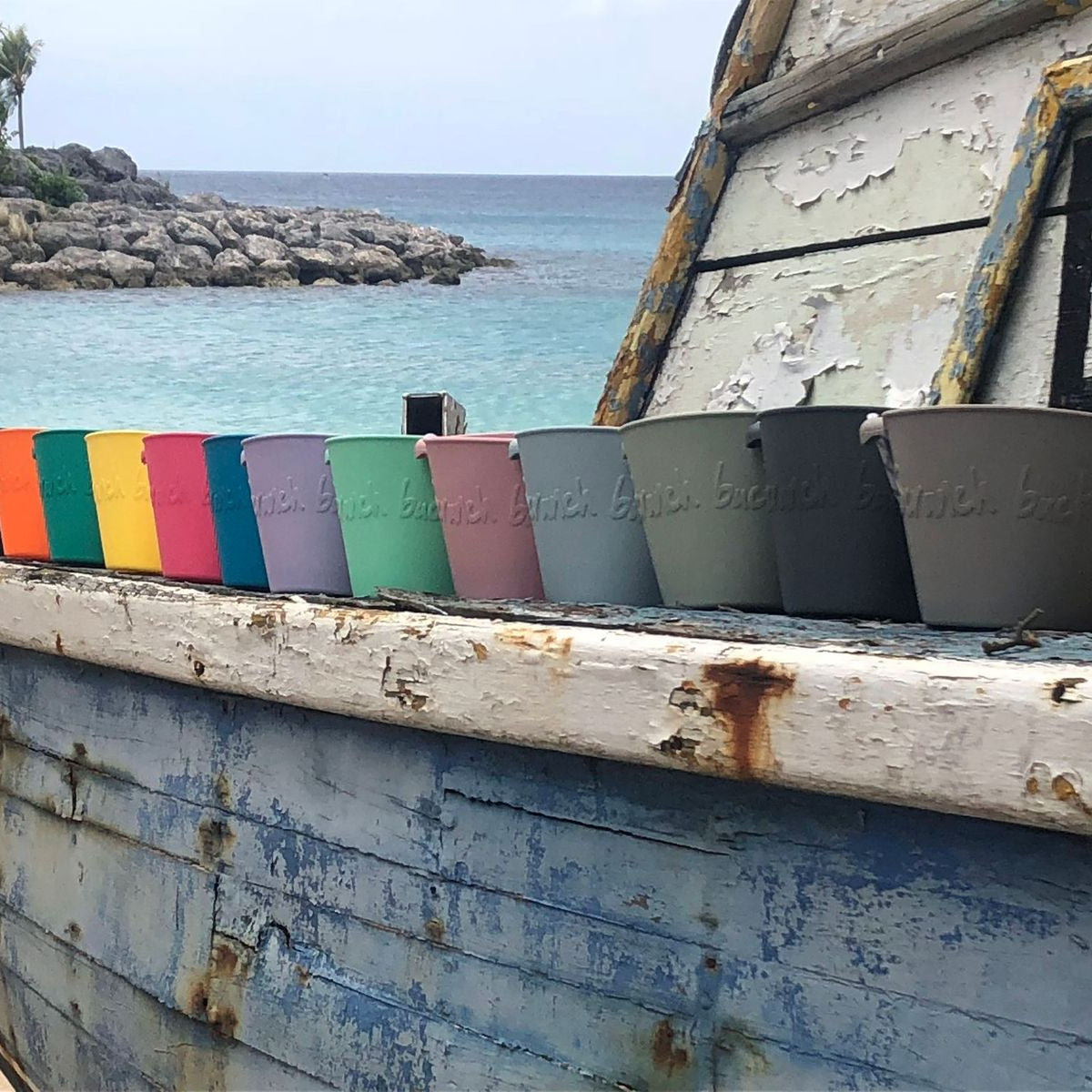 Scrunch buckets lined up in all the colours
