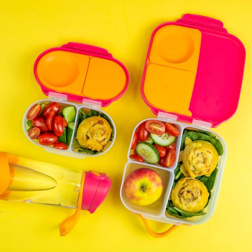 Packed snackbox and lunchbox and waterbottle in strawberry shake