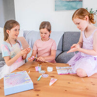 Kids making magic wands