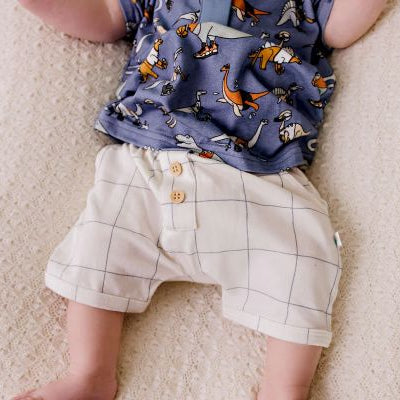 baby wearing the comfy shorts navy grid