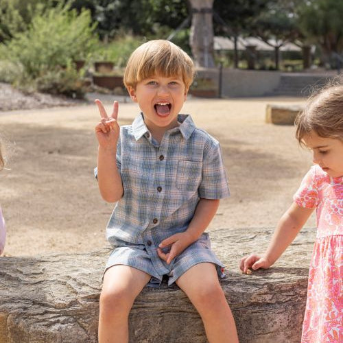 Boy wearing the dusty check shirt