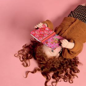 Little gilr reading the secret notebook