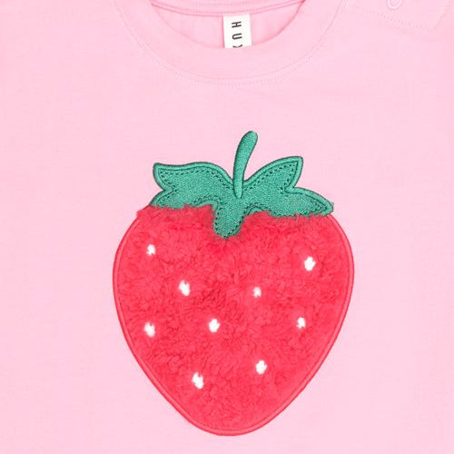 Close up of the furry strawberry slouchy tee