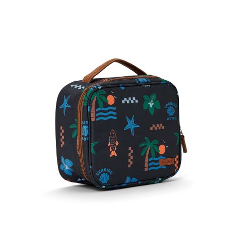 A rectangular insulated lunch bag with a top handle, featuring a dark navy blue background with a tropical beach print including palm trees, starfish, seashells, and orange seagulls. The bag has brown leather trim and handle, and a small brown leather tag.