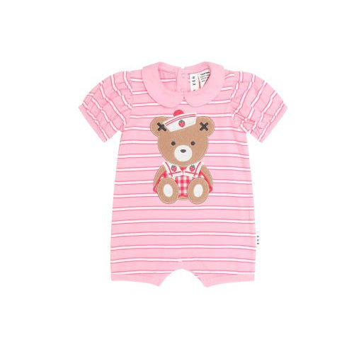 A pink baby short-sleeve romper with thin white horizontal stripes and a teddy bear applique on the chest, shown against a plain white background.