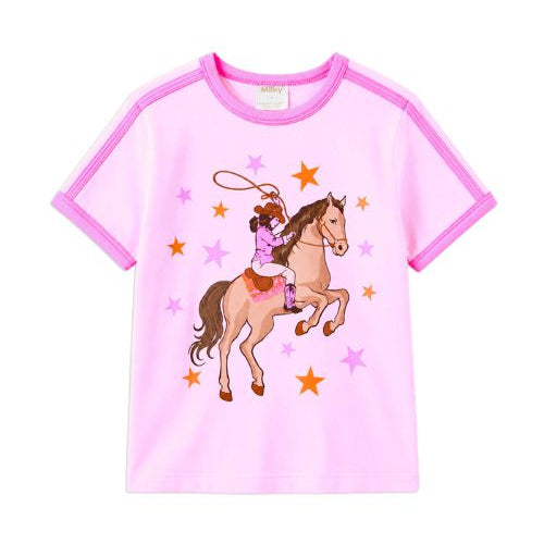 A pink short-sleeve kids' t-shirt with contrasting magenta trim on the collar and sleeves, featuring a central graphic of a cowboy riding a brown horse with orange and pink stars.