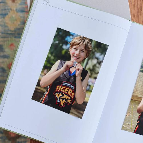 Inside page of the sports photos book sage