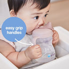 baby using b.box spout cup in color blush