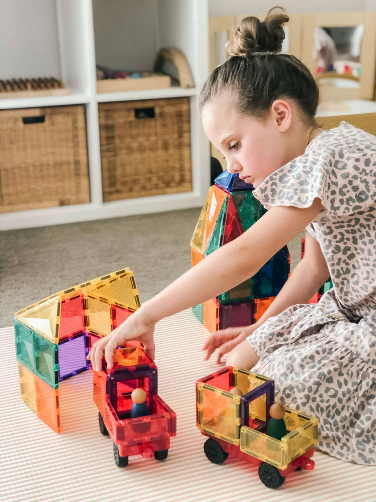 Girl playing with the 24 piece motion pack rainbow