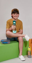 Boy using the lunchbox and waterbottle