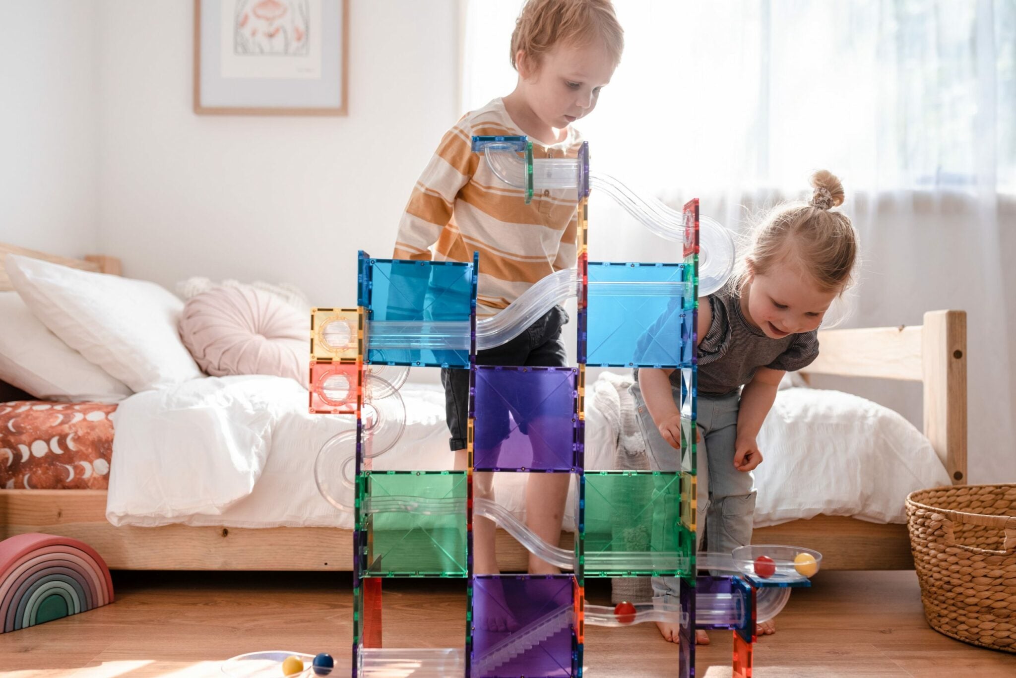 Kids playing with the 92 piece ball run set