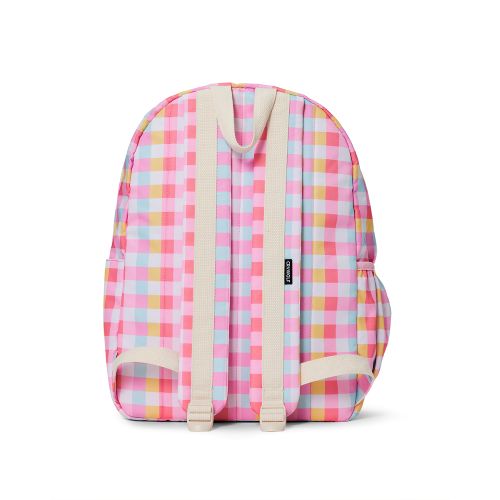 A backpack with a pastel pink, yellow, and light blue gingham pattern, featuring beige webbed shoulder straps and a small black brand tag on the back.