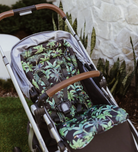 Pram seat liner in tropical on a pram