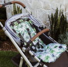 Pram seat liner on a pram in tropical print