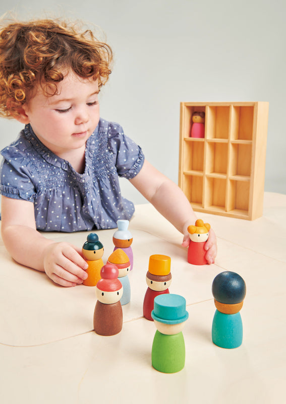 Child playing with the happy folk hotel