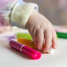 Child drawing with junior Markers