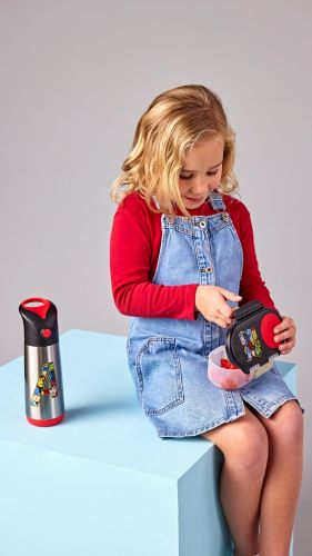 Girl with a water bottle and snackbox