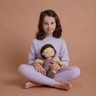 Little girl holding Bitsy dinkum doll