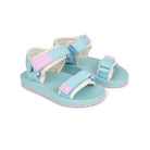 A pair of toddler sandals in light blue with white fleece lining and pastel pink accents, including adjustable straps and a matching pink outsole, shown on a white background.