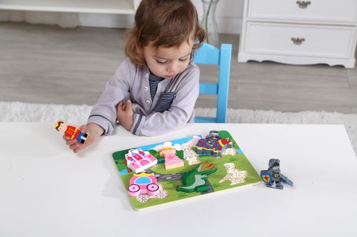 Child playing with a puzzle chunky princess