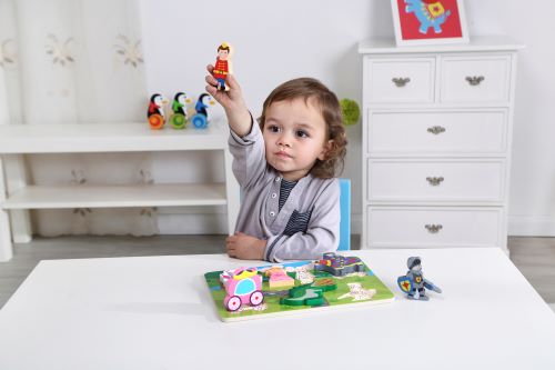 child playing with the chunky princess puzzle