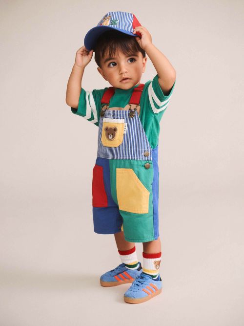 Toddler wearing the colour block overalls