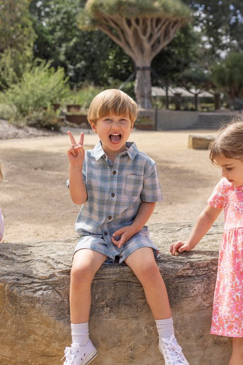 Boy wearing the dusty check shirt