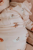 Frilly bodysuit in classic fawn print closeup 