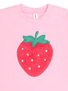Close up of the furry strawberry slouchy tee