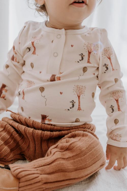 Toddler wearing Henley bodysuit in autumn bear print