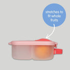 b.box mini lunch box in color flamingo fizz stretch section to fit whole fruits