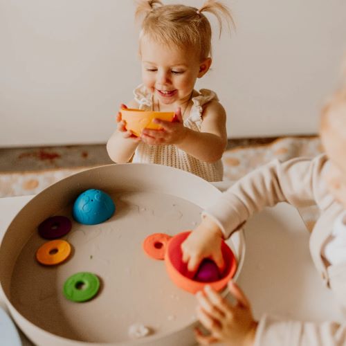 Kids playing with ocean stacking cups rainbow bright