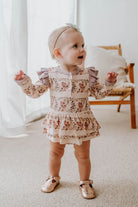 Toddler wearing Onesie flutter dress in vintage teddies