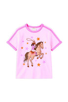 A pink short-sleeve kids' t-shirt with contrasting magenta trim on the collar and sleeves, featuring a central graphic of a cowboy riding a brown horse with orange and pink stars.