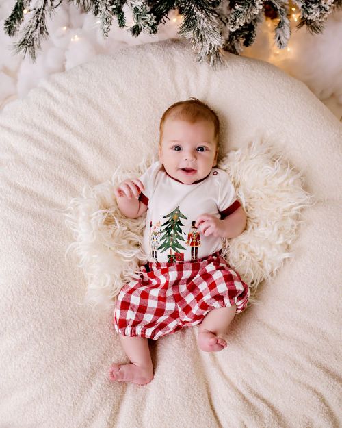 Baby wearing red gingham bloomers Confetti Kidz