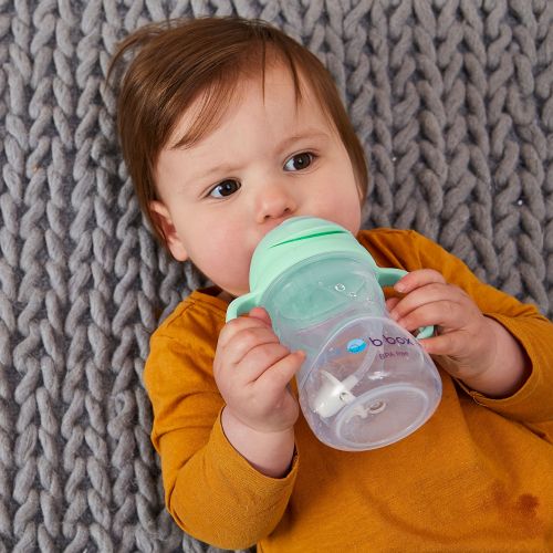 baby using b.box sippy cup