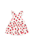 A white tiered baby dress with ruffled shoulder straps, featuring an all-over red strawberry print with green leaves, shown against a plain white background.
