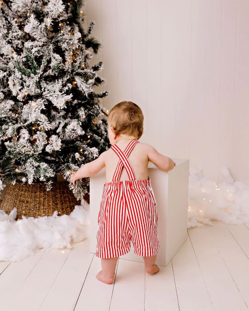 Back of the confetti kidz striped overalls candycane