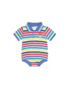 A baby short-sleeve polo romper with horizontal stripes in blue, red, yellow, green, and navy, featuring a blue collar, snap-button placket, and a small bear patch on the chest.